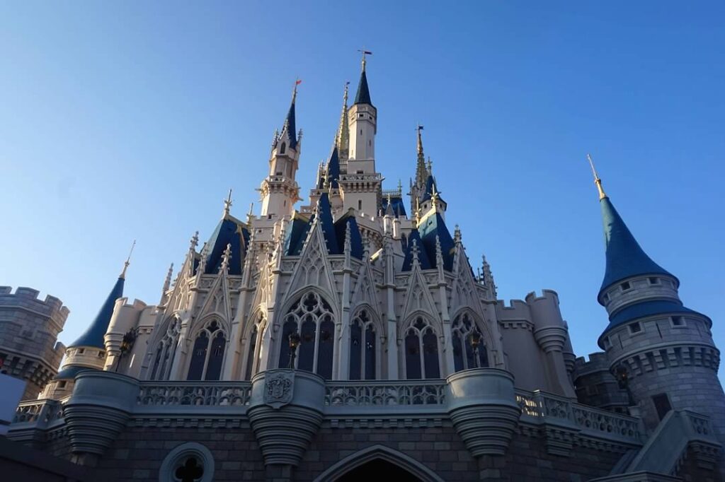 Cinderella's Castle in the Magic Kingdom in Walt Disney World.  A silver castle with blue turrets.  