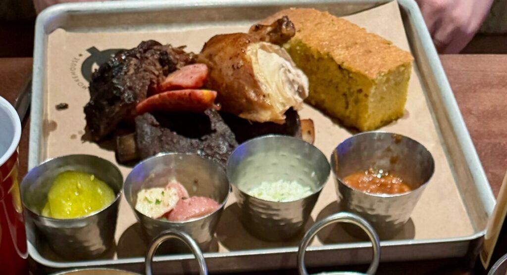 The Pitmaster Platter at Q Texas Smokehouse, a specialty dining restaurant on the NCL Bliss