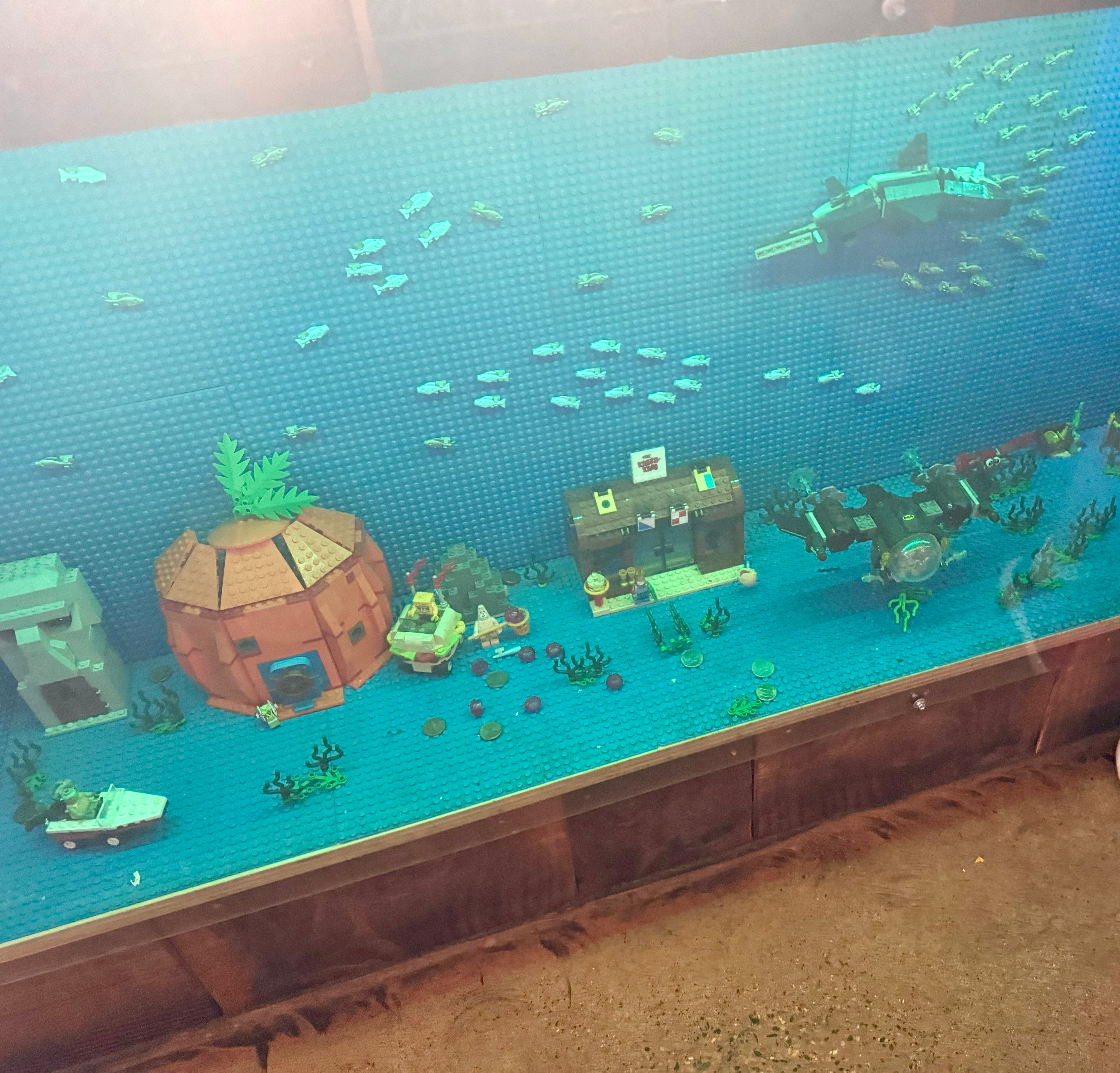 A Lego display featuring Spongebob Square Pants.  It appears to be under water. 