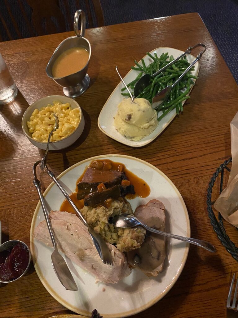 A Thanksgiving style meal is served family style